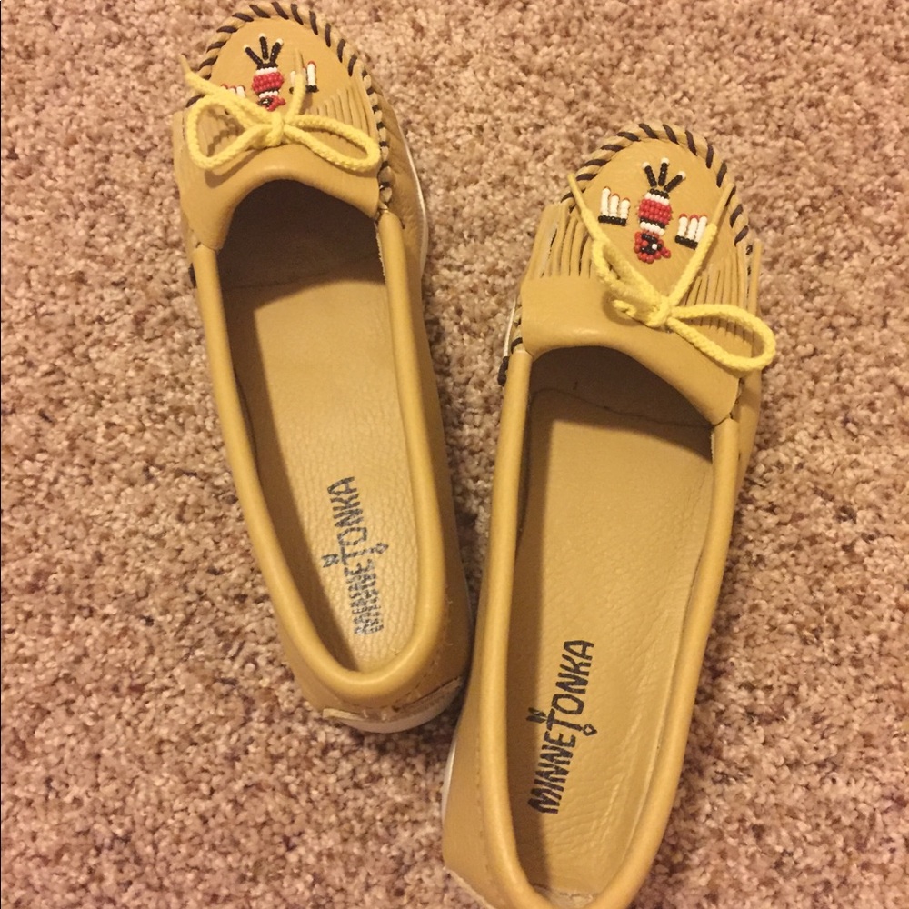 Minnetonka moccasins. Never worn.
